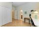 Bedroom with wood floors, and access to a bathroom at 6933 Quiet Creek Dr, Bradenton, FL 34212