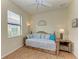 Cozy bedroom with a daybed and built-in storage at 6933 Quiet Creek Dr, Bradenton, FL 34212