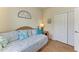 Charming bedroom with a daybed and built-in storage at 6933 Quiet Creek Dr, Bradenton, FL 34212