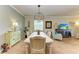 Dining room with chandelier and seating for six at 6933 Quiet Creek Dr, Bradenton, FL 34212