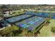 Community pickleball courts with players enjoying a game at 6933 Quiet Creek Dr, Bradenton, FL 34212