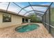 Private screened pool and patio with seating at 6933 Quiet Creek Dr, Bradenton, FL 34212