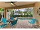 Relaxing screened pool area with patio furniture at 6933 Quiet Creek Dr, Bradenton, FL 34212
