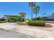Tennis center with building and surrounding landscaping at 6933 Quiet Creek Dr, Bradenton, FL 34212