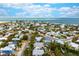 Aerial view of a two story home close to the beach at 727 Holly Rd, Anna Maria, FL 34216