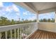 Private balcony offering a relaxing view of the neighborhood at 727 Holly Rd, Anna Maria, FL 34216