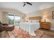 Spacious bedroom with king-size bed and water views at 727 Holly Rd, Anna Maria, FL 34216