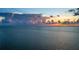 Stunning sunset over the ocean with colorful clouds at 727 Holly Rd, Anna Maria, FL 34216