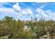 Scenic waterfront view with lush vegetation and calm waters at 727 Holly Rd, Anna Maria, FL 34216