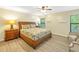Comfortable bedroom with a queen-size bed and sitting area at 752 Tropical Cir, Sarasota, FL 34242