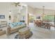 Large dining area with wooden table and access to patio at 752 Tropical Cir, Sarasota, FL 34242