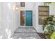 Green front door welcomes guests to this beautiful home at 752 Tropical Cir, Sarasota, FL 34242