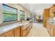 Kitchen with stainless steel appliances and ample cabinetry at 752 Tropical Cir, Sarasota, FL 34242
