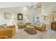 Vaulted ceilings and stylish furniture highlight this living room at 752 Tropical Cir, Sarasota, FL 34242