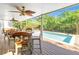 Inviting pool area with a patio and seating for lounging at 752 Tropical Cir, Sarasota, FL 34242