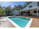 Sparkling pool with a spacious deck for sunbathing at 752 Tropical Cir, Sarasota, FL 34242