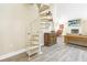 Unique spiral staircase connects the floors of this home at 752 Tropical Cir, Sarasota, FL 34242