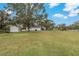 Large backyard with shed and expansive lawn at 7565 64Th E Ct, Palmetto, FL 34221