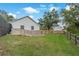 Spacious backyard with wooden fence and storage shed at 7565 64Th E Ct, Palmetto, FL 34221