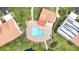 Community pool and surrounding buildings from above at 764 Avenida Estancia # 208, Venice, FL 34292