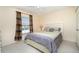 Bedroom with green bedding and ceiling fan at 764 Avenida Estancia # 208, Venice, FL 34292