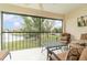 Relaxing screened balcony overlooking pond at 764 Avenida Estancia # 208, Venice, FL 34292
