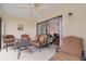 Spacious screened patio with access to living area and outdoor furniture at 764 Avenida Estancia # 208, Venice, FL 34292