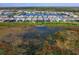 Aerial view of home with lake access at 8050 Redonda Loop, Lakewood Ranch, FL 34202