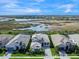 Luxury home community with preserve views; single-Gathering homes with tile roofs at 8050 Redonda Loop, Lakewood Ranch, FL 34202