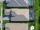 Luxury home with pool and spa; grey tile roof and paver driveway at 8050 Redonda Loop, Lakewood Ranch, FL 34202