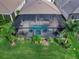 Aerial view of house with large screened in pool area at 8050 Redonda Loop, Lakewood Ranch, FL 34202