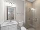 Clean bathroom with a glass shower and white vanity at 8050 Redonda Loop, Lakewood Ranch, FL 34202