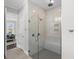 Modern bathroom with a large walk-in shower at 8050 Redonda Loop, Lakewood Ranch, FL 34202