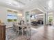 Bright dining room with sliding doors leading to outdoor patio at 8050 Redonda Loop, Lakewood Ranch, FL 34202