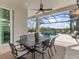 Outdoor dining area with pool and patio views at 8050 Redonda Loop, Lakewood Ranch, FL 34202