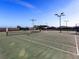 Well-lit tennis court with ample space at 8050 Redonda Loop, Lakewood Ranch, FL 34202