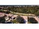 Aerial view of homes and lush landscape at 8282 Parkside Dr, Englewood, FL 34224