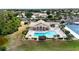Community pool and clubhouse at 8282 Parkside Dr, Englewood, FL 34224