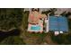 Community pool and tennis courts at 8282 Parkside Dr, Englewood, FL 34224