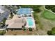 Aerial view of community pool and tennis courts at 8282 Parkside Dr, Englewood, FL 34224