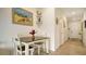 Small dining area with table and chairs near entryway at 8533 Lunar Skye St, Sarasota, FL 34241