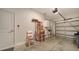 Attached garage with extra storage and organization at 8533 Lunar Skye St, Sarasota, FL 34241