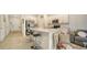 Modern kitchen features stainless steel appliances and island at 8533 Lunar Skye St, Sarasota, FL 34241