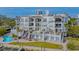 Luxury condo building, featuring a pool and private balconies at 888 S Orange Ave # 3D, Sarasota, FL 34236