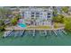 Waterfront condo building with a pool and private boat docks at 888 S Orange Ave # 3D, Sarasota, FL 34236