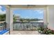 Spacious balcony with water views and seating at 888 S Orange Ave # 3D, Sarasota, FL 34236