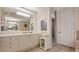 Large bathroom with a walk-in shower and double vanity at 888 S Orange Ave # 3D, Sarasota, FL 34236
