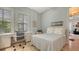 Serene bedroom with built-in workspace and access to living room at 888 S Orange Ave # 3D, Sarasota, FL 34236