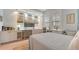 Light and airy bedroom with built-in workspace and window seat at 888 S Orange Ave # 3D, Sarasota, FL 34236
