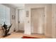 Elegant entryway with elevator access and wood floors at 888 S Orange Ave # 3D, Sarasota, FL 34236